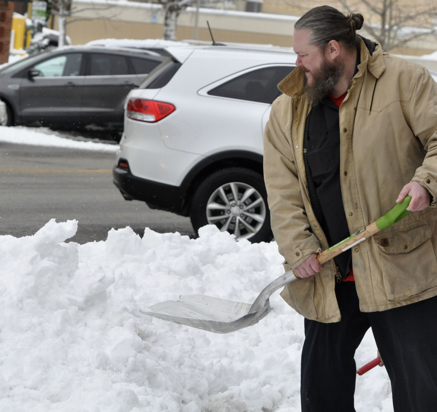 Kevin Kazimier shovels snow in front of Lake Aire Restaurant, 804 W. Main St. in Lake Geneva